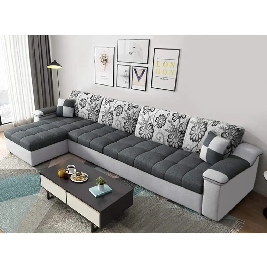 FURNY Carlito 8-seater L-shaped fabric sofa set in light grey and dark grey with left-hand side chaise, matching center table, and two puffy stools.
